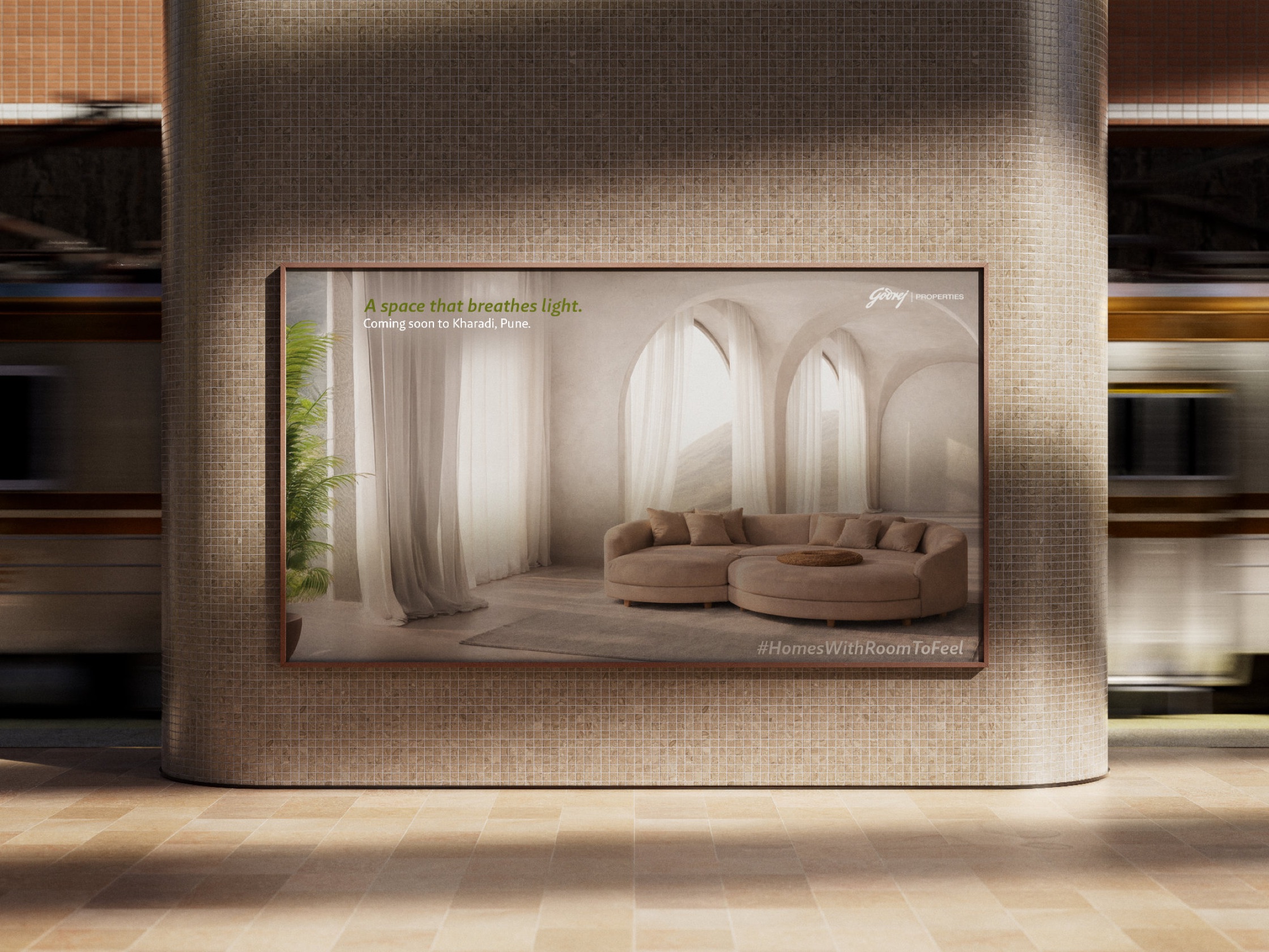 A lit metro-station panel showing a warm arched living room with a curved sofa, the platform blurred past it.