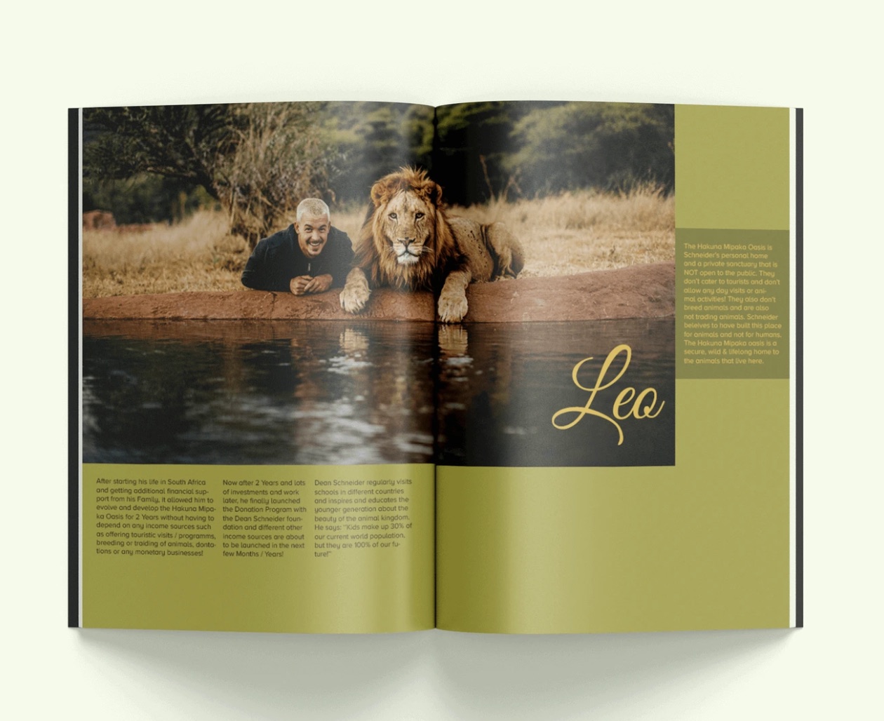 Printed mockup of the Leo spread, a lion at a waterhole on olive pages.